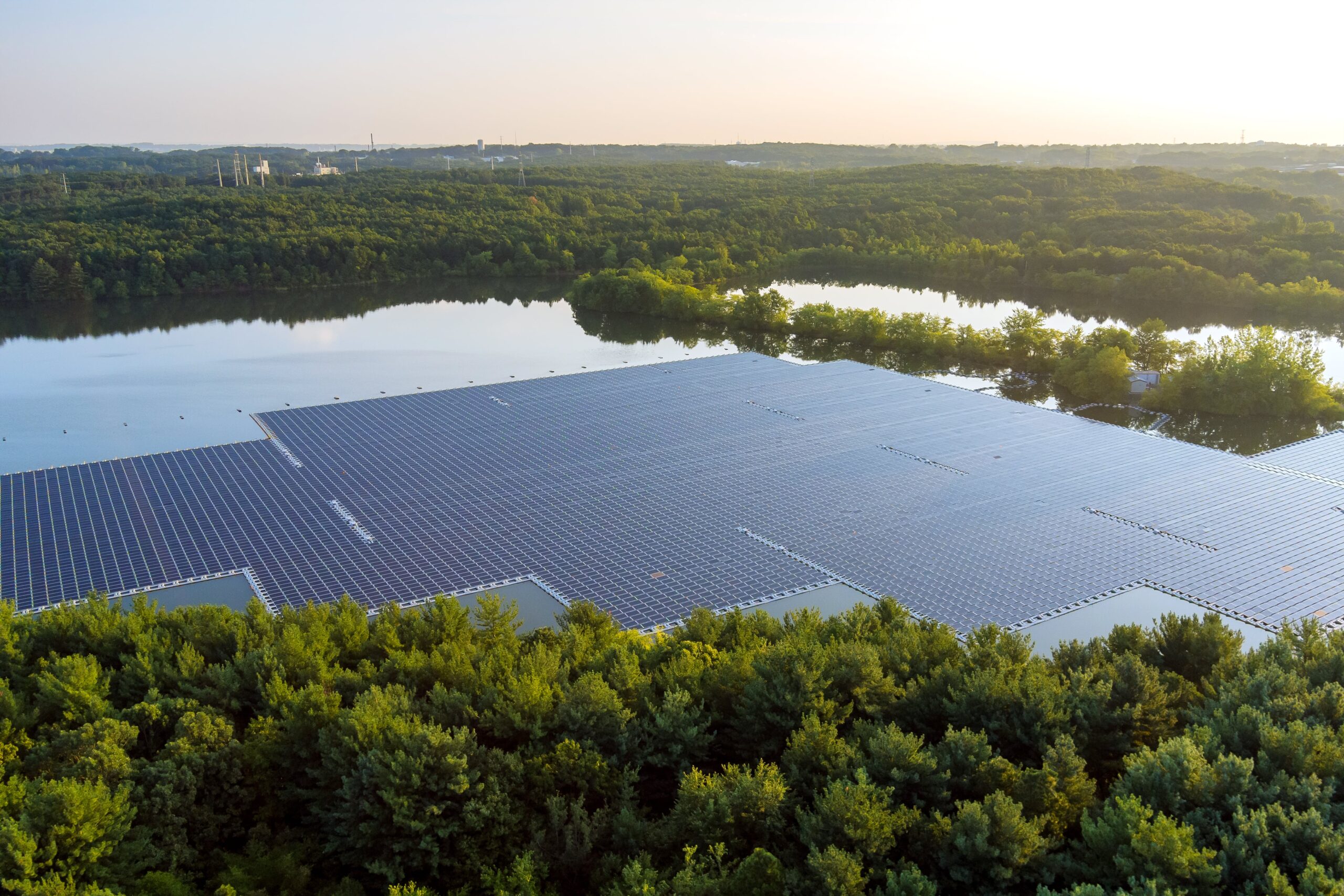 panorama-aerial-view-renewable-alternative-electricity-energy-floating-solar-panels-cell-platform-beautiful-lake-min