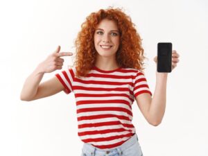 https://doradcy365.pl/wp-content/uploads/2023/01/you-need-see-attractive-smiling-joyful-redhead-curly-blueeyed-girl-25s-stylish-blogger-promote-app-device-hold-smartphone-pointing-cellphone-display-grinning-recommend-use-application-min-300x225.jpg